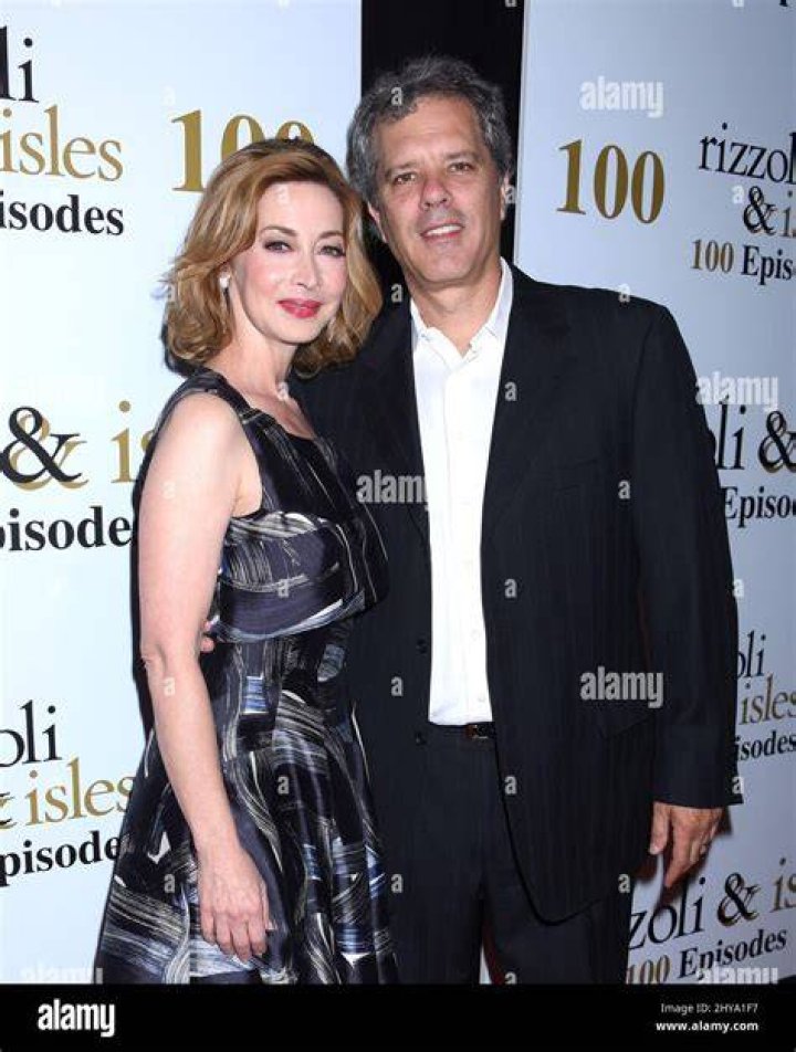 Dr. Tom Apostle, Sharon Lawrence's Husband